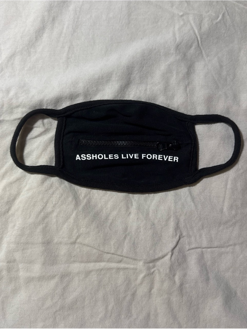 Black Face Mask with Front Zipper and Bold White Text